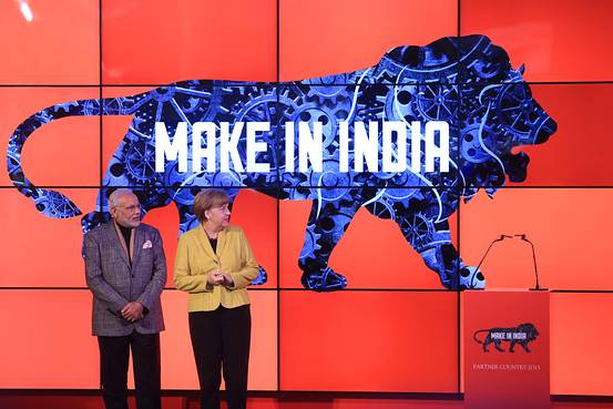 German Chancellor Angela Merkel,and Indian Prime Minister Narendra Modi, stand on stage at the Hanover industrial fair in Germany. AMF NEWS